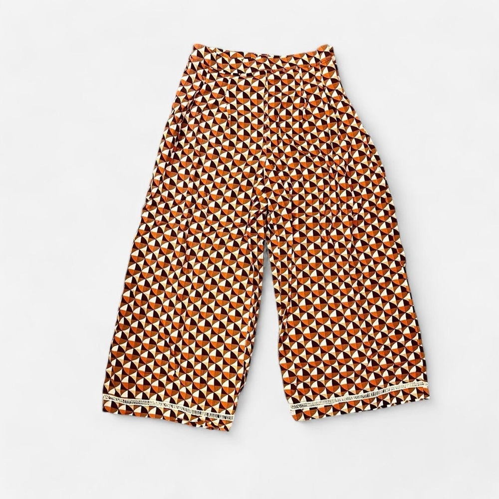 Orange, brown, and white geometric print wide leg pants